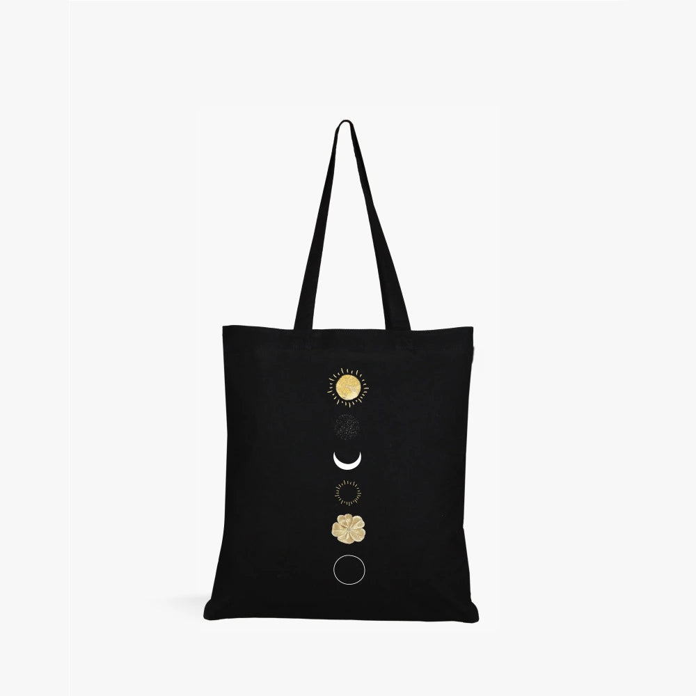 black canvas tote bag for women,
celestial tote bag,moon phase tote bag,sun and moon print tote bag,aesthetic black tote bag,
eco-friendly canvas tote bag,durable cotton tote bag,minimalist tote bag for women,spiritual moon tote bag,
celestial design canvas bag,
everyday canvas tote for women