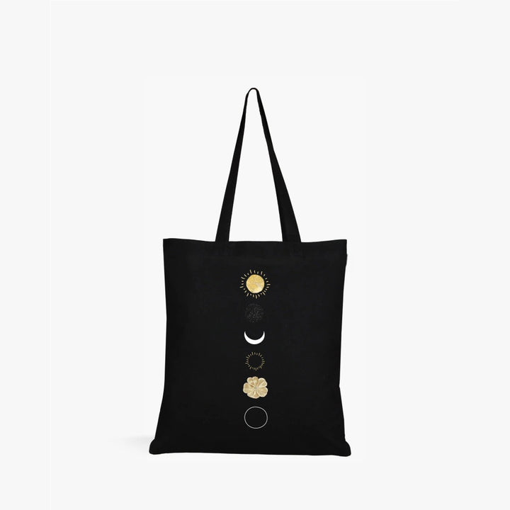 black canvas tote bag for women,
celestial tote bag,moon phase tote bag,sun and moon print tote bag,aesthetic black tote bag,
eco-friendly canvas tote bag,durable cotton tote bag,minimalist tote bag for women,spiritual moon tote bag,
celestial design canvas bag,
everyday canvas tote for women